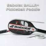 Unmasking the Babolat BALLR+ Pickleball Paddle. Discover why US pros customize its low twist weight and how its $99 price tag reshapes the market